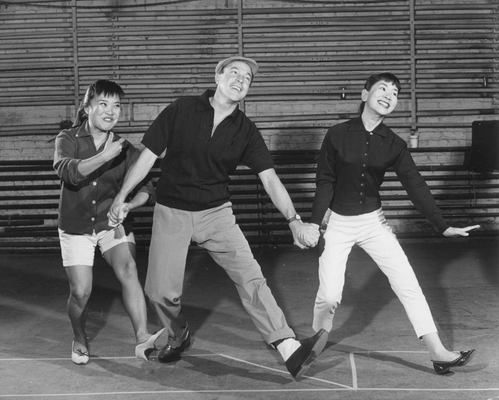 A rehearsal photo from the 1958 Broadway production of Flower Drum Song.